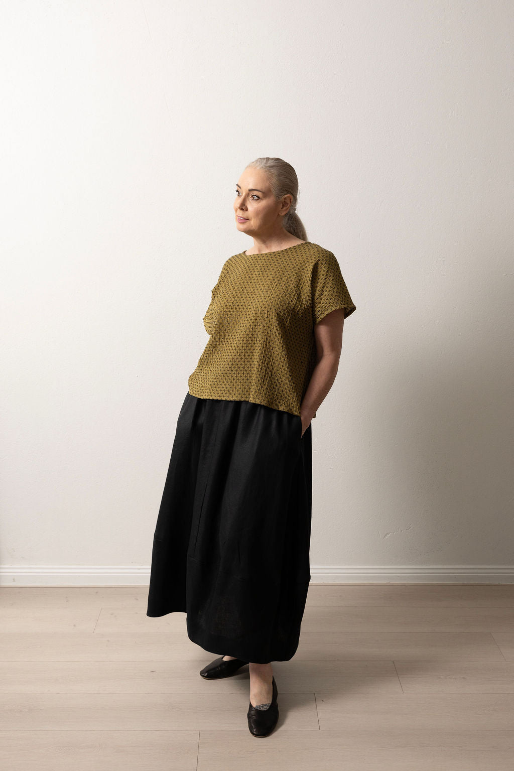 East Village Tee in Olive Green Cotton with Black Embroidery