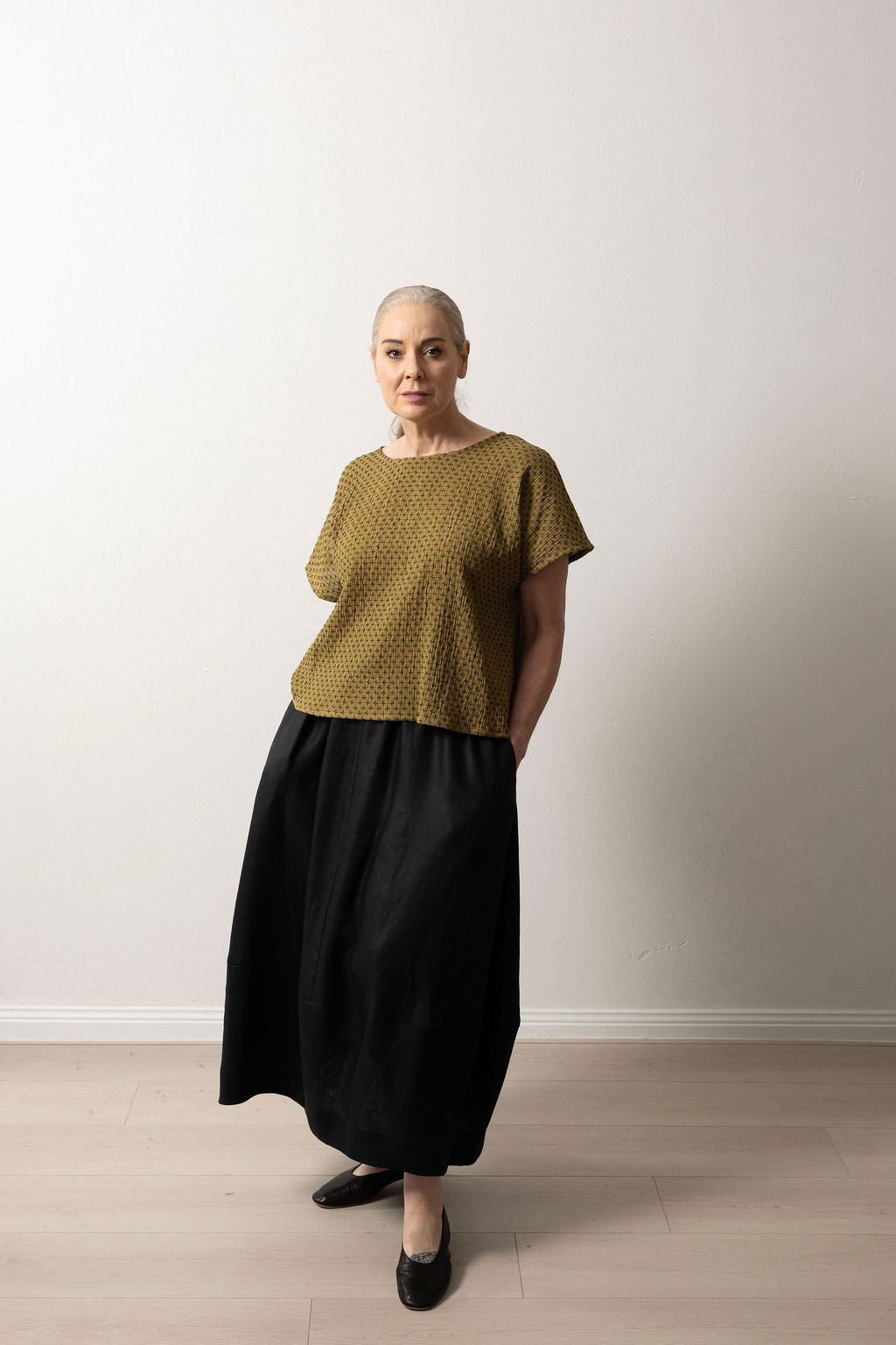 East Village Tee in Olive Green Cotton with Black Embroidery