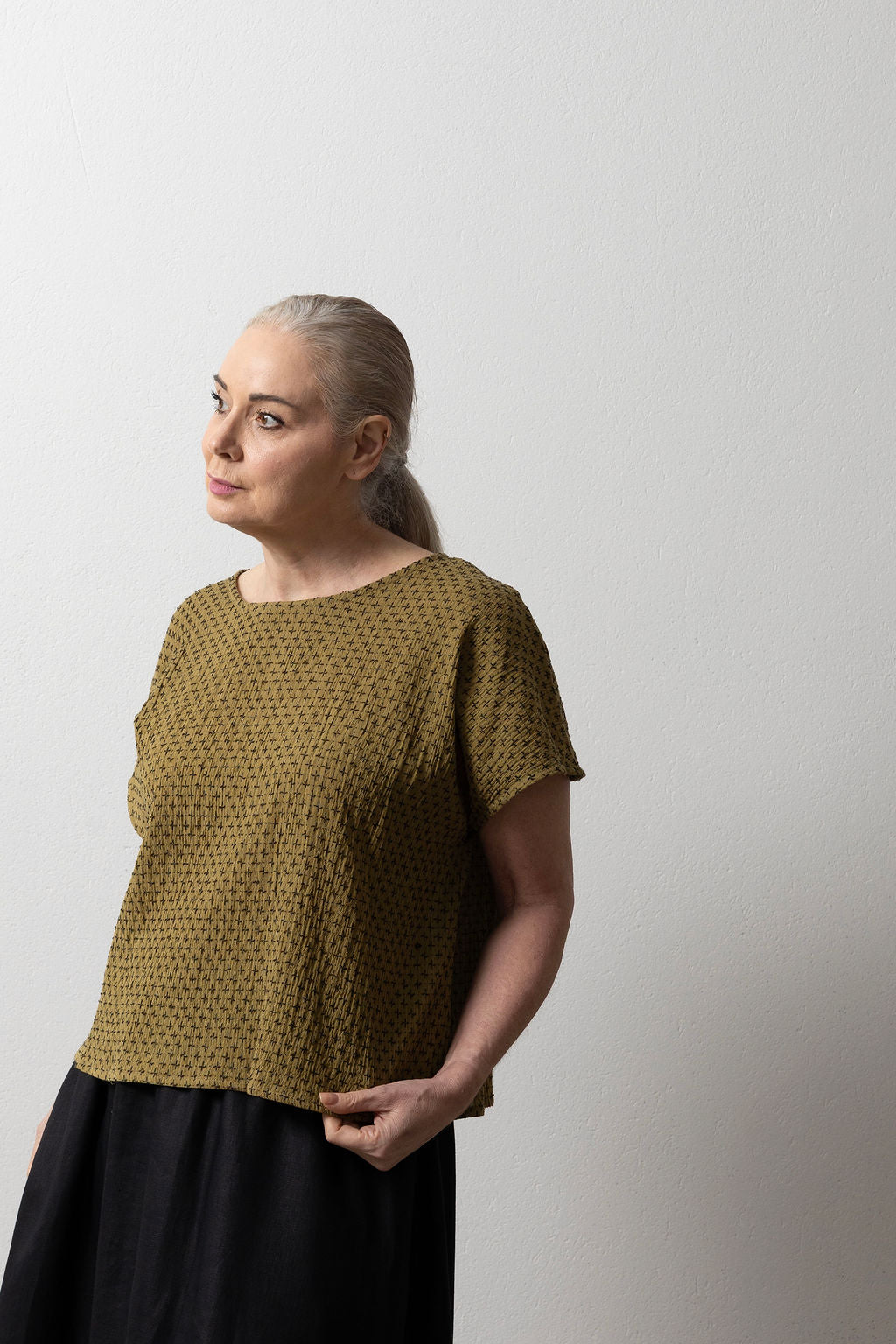 East Village Tee in Olive Green Cotton with Black Embroidery