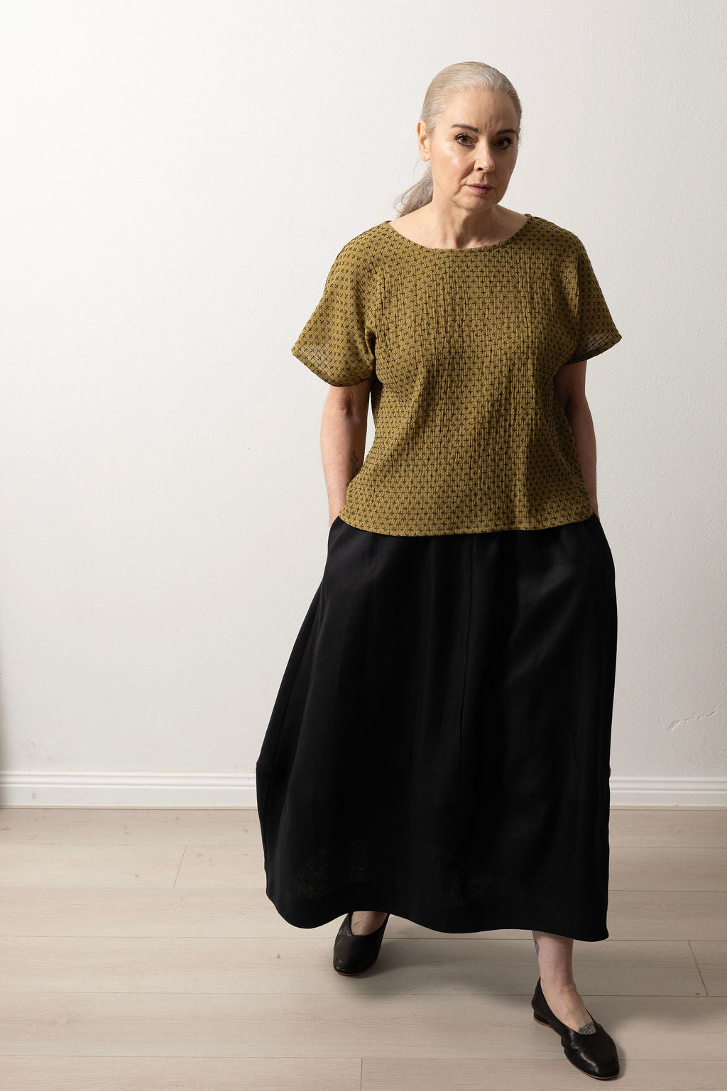 East Village Tee in Olive Green Cotton with Black Embroidery