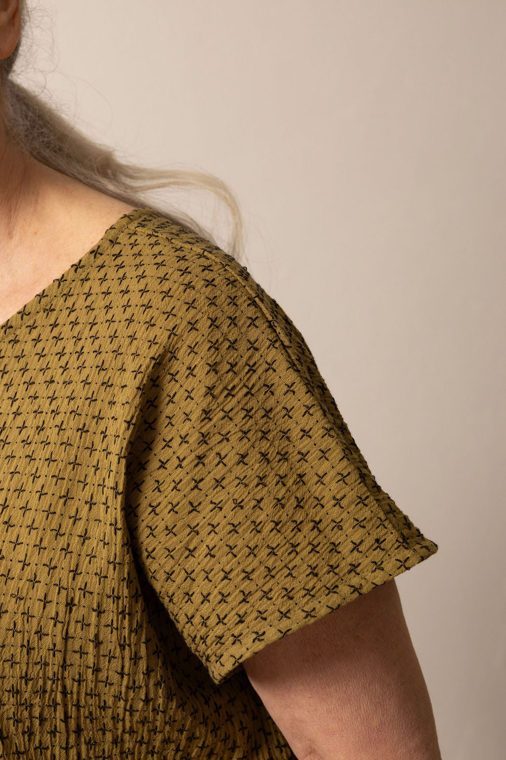 East Village Tee in Olive Green Cotton with Black Embroidery