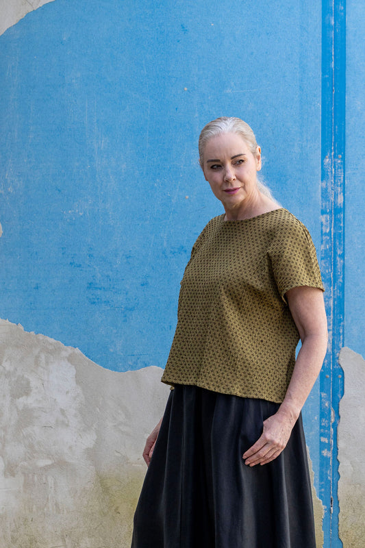 East Village Tee in Olive Green Cotton with Black Embroidery